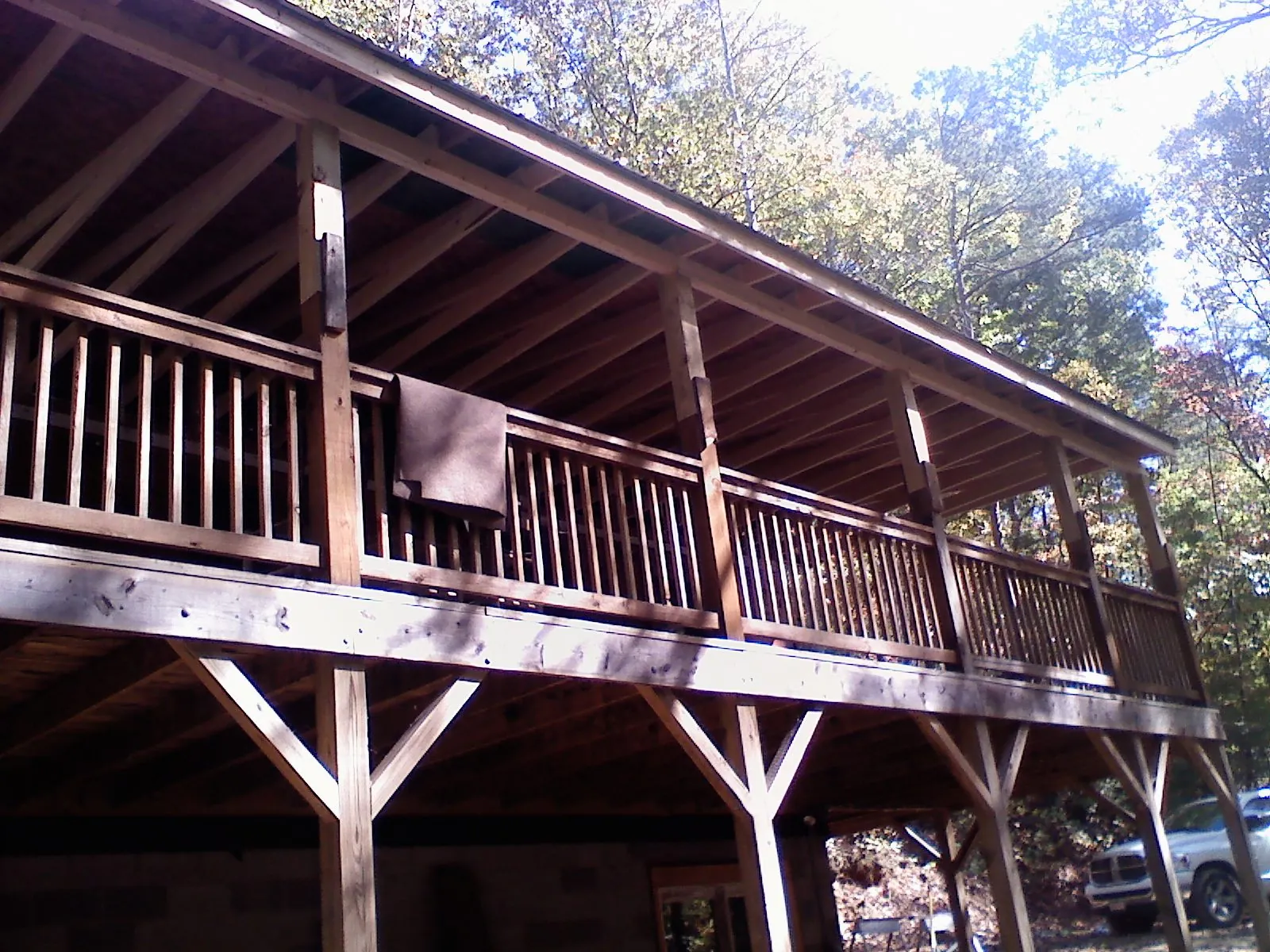 Timber framing under a new elevated porch and deck — Roof Leak Repair in Snow Shoe by Roofing Brothers